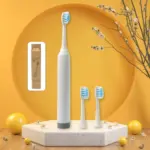 Electric toothbrush with three brush heads and waterproof design - obeepo.in