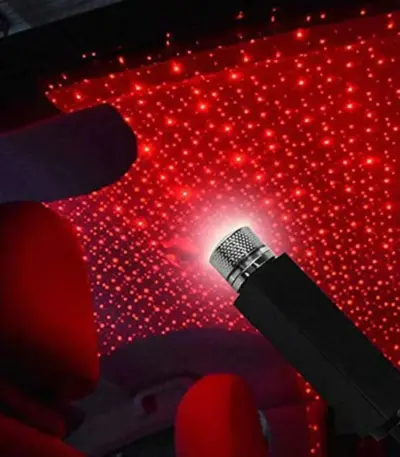 USB Star Projector Night Light creating a romantic starry atmosphere in a car or bedroom. - Obeepo.in